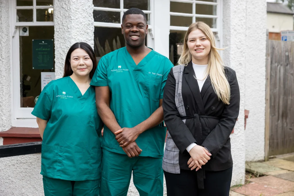 Team of dental professionals at Nonsuch Park Dental, showcasing their friendly atmosphere.